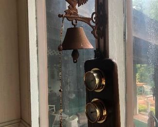 dinner bell, breakfast bell, and a bevy of brass dials
