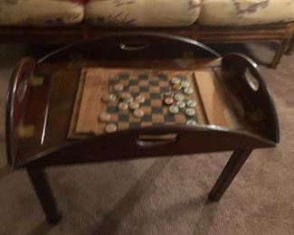 flip ends table with handle holes, checkers set with bottle-cap checkers
