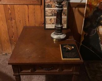 Side table with antique lamp missing what was probably a really cool glass shade