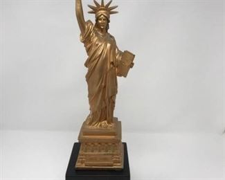 Statue of Liberty and 2 $1 coins https://ctbids.com/#!/description/share/222860