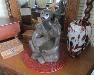 Central American terracotta seated figure, signed by the sculptor. Superb.