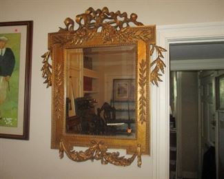 Elaborate gilt mirror