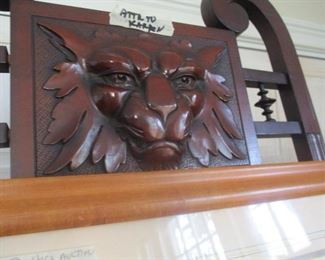 Carved Head on the Horner Easel