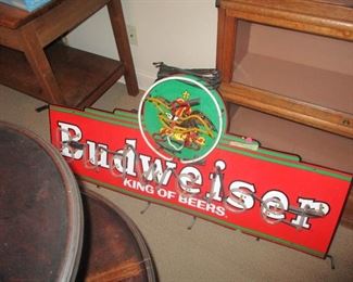 Budweiser neon sign. There is also a Miller Beer neon clock.