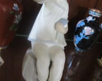 Lladro girl with doll