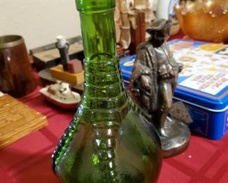 This will be my luck when they photograph my Estate Sale when I die.    Well....we found a bunch of old liquor bottles.  That reminds me of a story....Ask me about Mr. whatshisname.  His wife never knew.  He had a bar in the attic.  Not this man, another estate sale that we did.