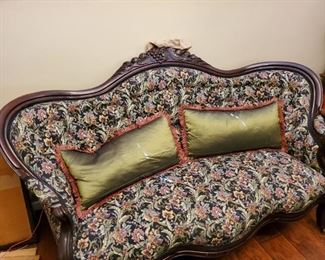 Another beautiful settee.  Obviously this one has been reupholstered, but it is beautiful.  Rollers are still intact