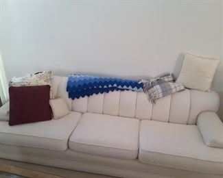 Beige 3 Seater Couch! Blankets and Pillows!