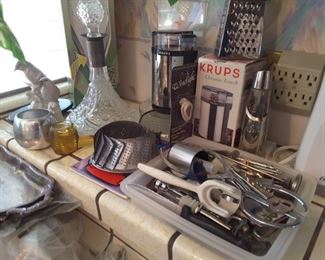 Kitchen everyday utensils. Small appliances and Cut Glass Decanter. Many other fun collectibles.