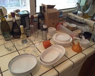 Everyday Households, casserole dish sets, small utensils and measuring items, some alcohol, vinegar and oil sets. Small ramekins.