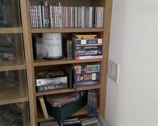 Family Unit filled with DVD's, VHS and Dictionaries and Interesting Books to read!