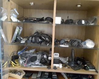 View of Family Unit filled with Headphones, small Microphones, Cables, Extension Cables, Lots of Remotes!