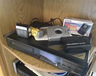 Cassette Player and miniature Radios.