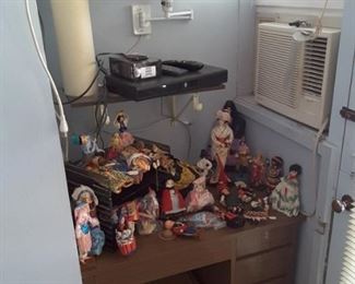 Collection of Special Dolls from Around The World! TIVO Unit which goes with the RCA TV. Dolls in box underneath the small desk. Desk is hinged to the wall so not for sale.