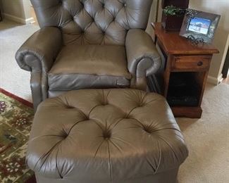 Leather La-z-boy chair and ottoman - excellent condition