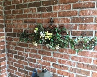 Metal decorative piece at front door