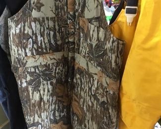 Lots of hunting clothes and equipment; various manufacturers and various sizes.