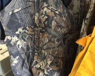 Lots of hunting clothes and equipment; various manufacturers and various sizes.