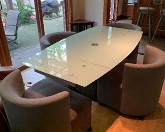 EXPANDABLE GLASS TABLE WITH 4 CHAIRS FROM HILLSIDE 
TABLE EXPENDED
39.5”W x 71”L x 29.5”H
TABLE 39.5”L x 39.5”W x 29.5”H
