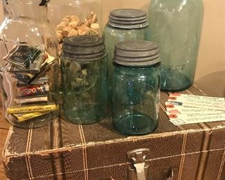 Ball jars, blue glass, snazzy storage, vintage jars, vintage suitcases