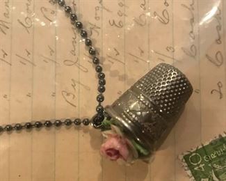 Necklace repurposed from a thimble.