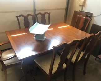 Table has leaves and table pads