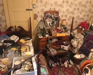 Clothes...so many clothes, shoes and hand bags.  Also some cool furniture. Twin beds and a nice wood dresser. 