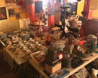 Vintage and antique collectibles...teacups, plates, old toasters, cast iron, glass, stereos, furniture. Its fun just to see this cool party room...
