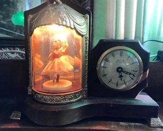 In working Condition, a Vintage Clock with music and  turning dancer