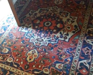 Two rugs of this style