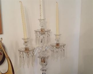 Beautiful candelabras with prisms in home.  Several pairs. 