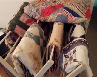 quilts on folding rack