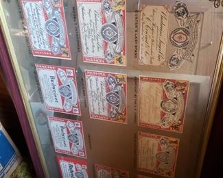 lots of framed Bar art, beer and liquor