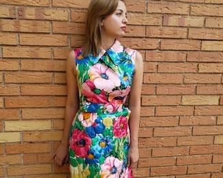 many pieces of vintage clothing ranging from the 1920's to the 1990's