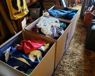 overflow of vintage clothing is in boxes upstairs