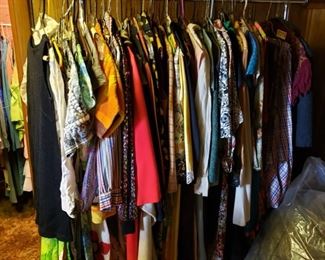 2 large racks of vintage clothing are upstairs in attic room.