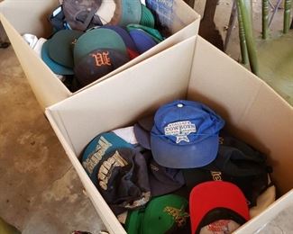 a couple of hundred ball caps. They are not new..could be some cool ones in here