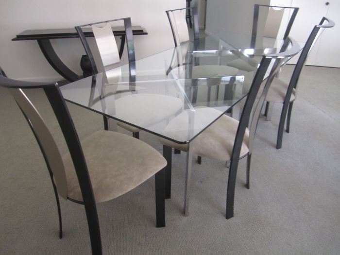 GLASS TOP TABLE AND 6 CHAIRS BY ELITE