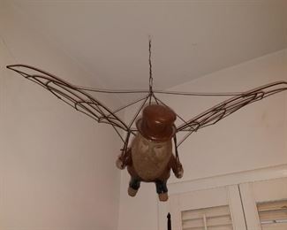 Pottery sculpture airplane man