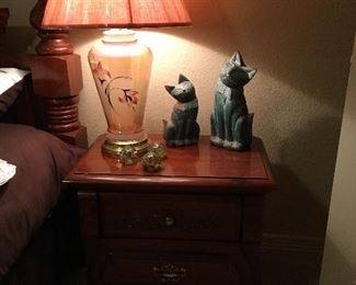 Another pair of pretty table lamps sitting on night stands.