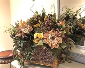 Planter with faux floral arrangement