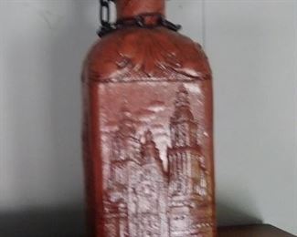 Hand-tooled leather covered decanter