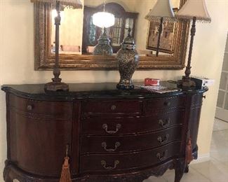 Marble topped buffet with tassels