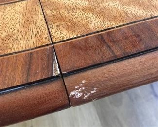 Scuff marks. Slight on table. Mostly on the leaf