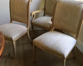 Set of 6 Kreiss Sabre leg, roll back dining chairs with upgraded Donghia to jours upholstery in ecru. Some wear on arms of 2 arm chairs. Upholstery in excellent condition. $800 for 8 chairs