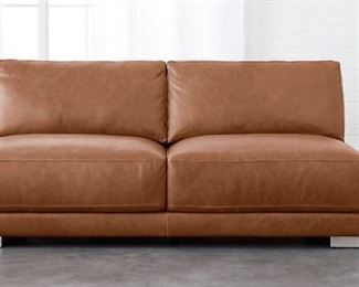 CB2 Gybson 70” cognac lightly distressed leather armless sofa. Only used for staging. In GREAT condition. $1,000.00