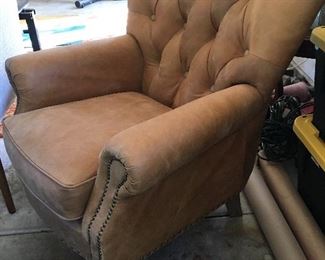 Distressed cognac leather tufted club chair. 35” wide, 36” deep, 36” high. Seat height: 19”. Great condition. Leather just feels a bit dry. $200.00