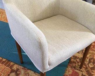 Close up of Ellis armchair. Neutral fabric no longer available online. Compact yet very comfortable. 21” wide, 19” deep, 31” back height. Arm height 26”. Seat height 28”.