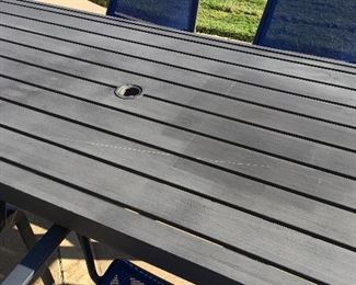 Tabletop has some fading and one scratch