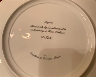 Set of 4 NEVER USED gorgeous Lalique Lupins charger plates. Retailed for over $100 per plate. Selling all 4 for $200.00. Mint condition.